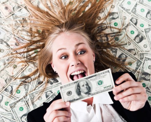 rolling in money lady excited