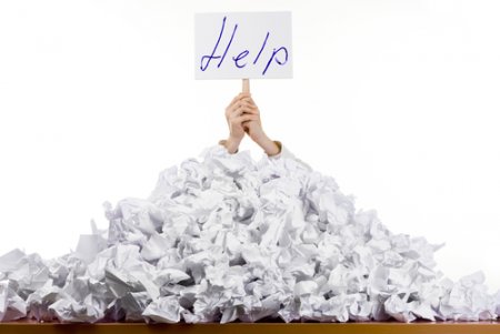 Overwhelmed Person Holding aHelp Sign